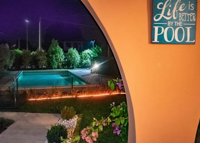 Апартаменты Charme And Relax With Garden And Swimming Pool